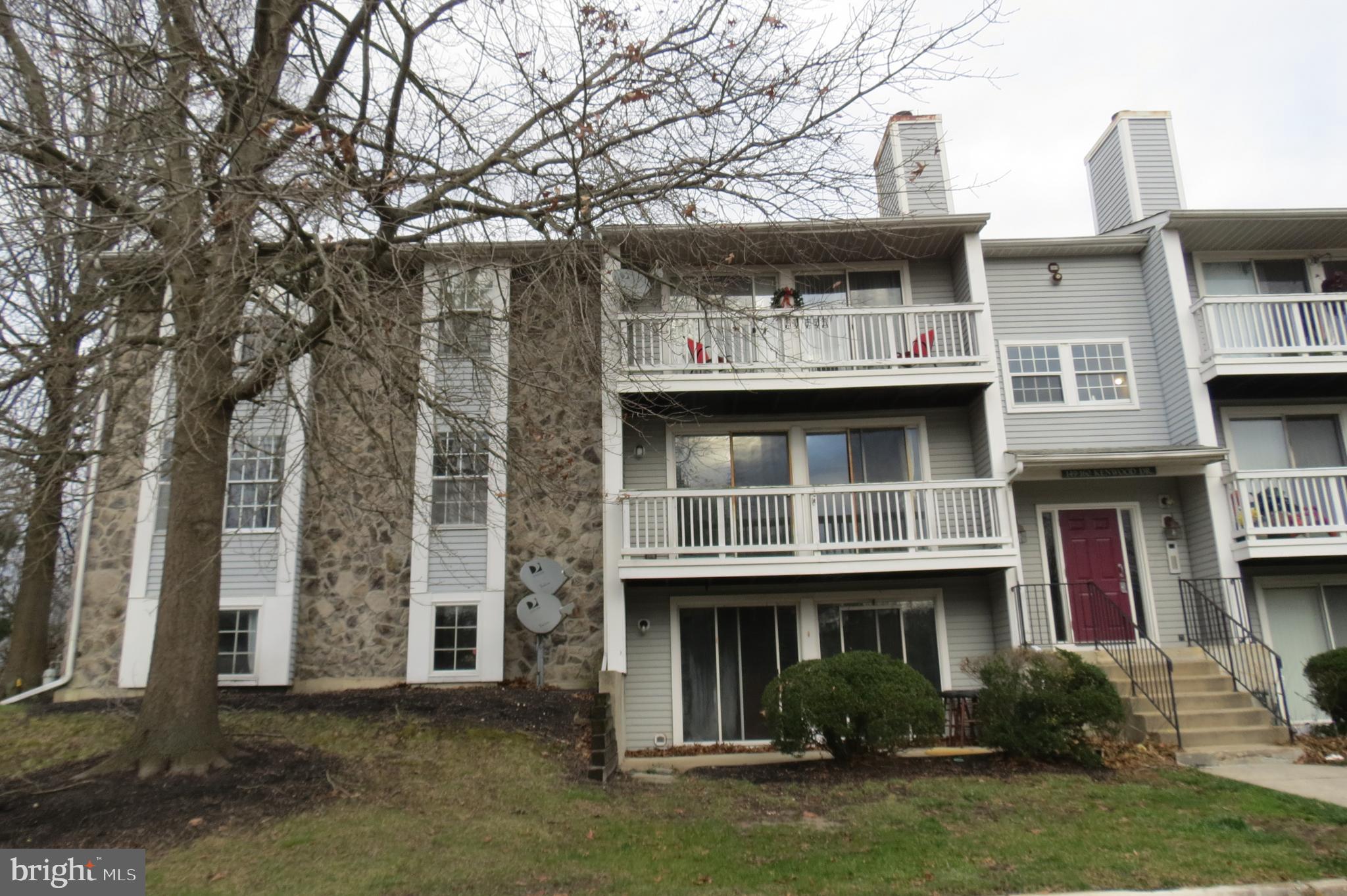 153 Kenwood Drive Sicklerville, NJ 08081 - Photo 1 of 13 a view of house with yard and plants
