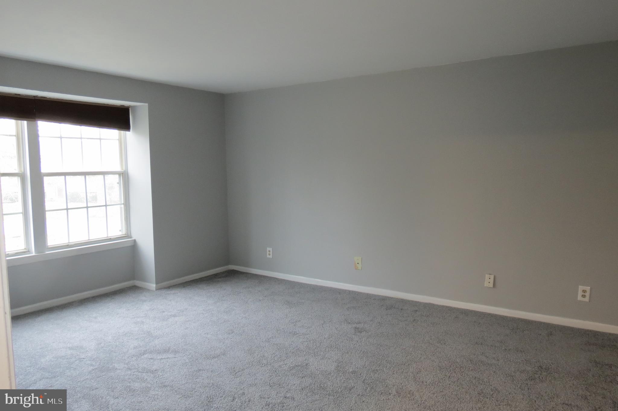 153 Kenwood Drive Sicklerville, NJ 08081 - Photo 11 of 13 an empty room with a window