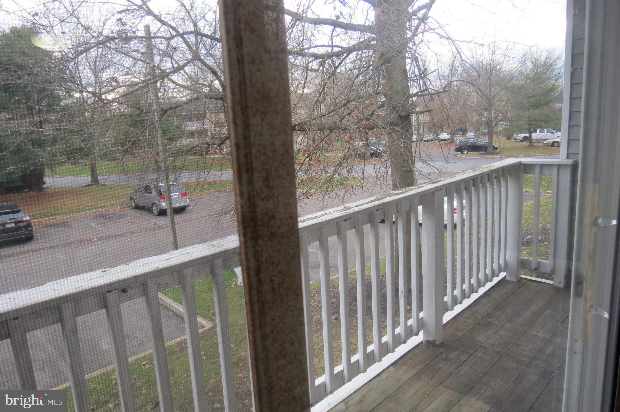 153 Kenwood Drive Sicklerville, NJ 08081 - Photo 13 of 13 a view of a balcony with wooden floor