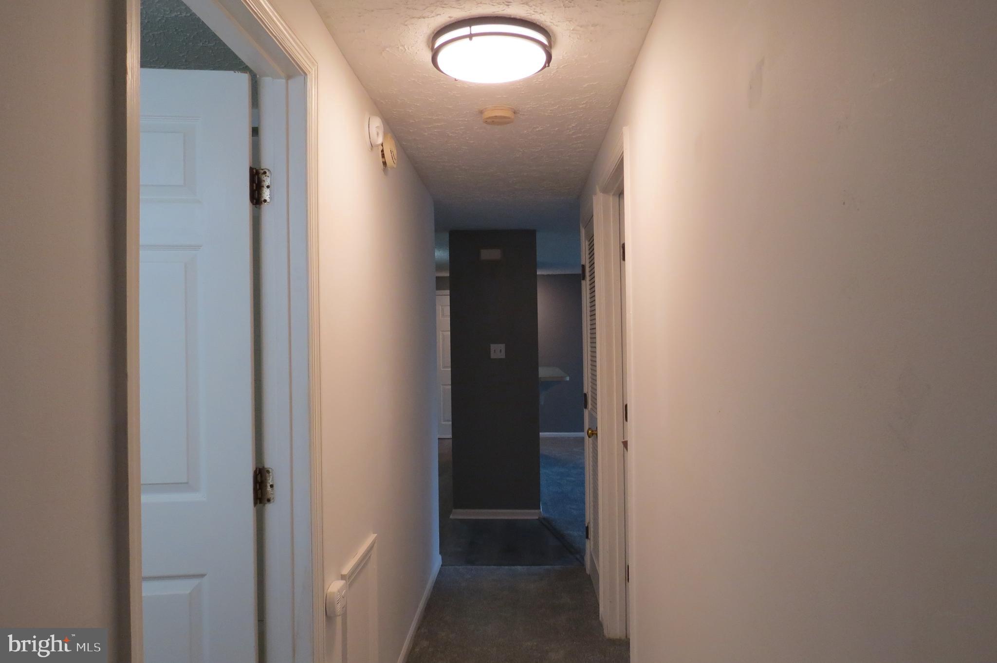 153 Kenwood Drive Sicklerville, NJ 08081 - Photo 8 of 13 a view of a hallway