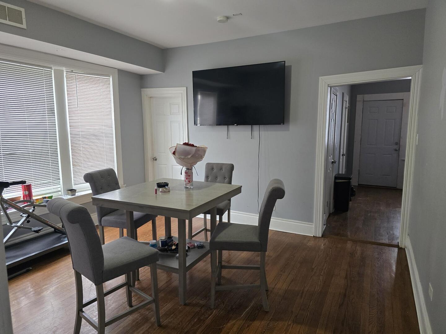 7317 South Union Avenue Chicago, IL 60621 - Photo 13 of 26 a view of a dining room with furniture and wooden floor