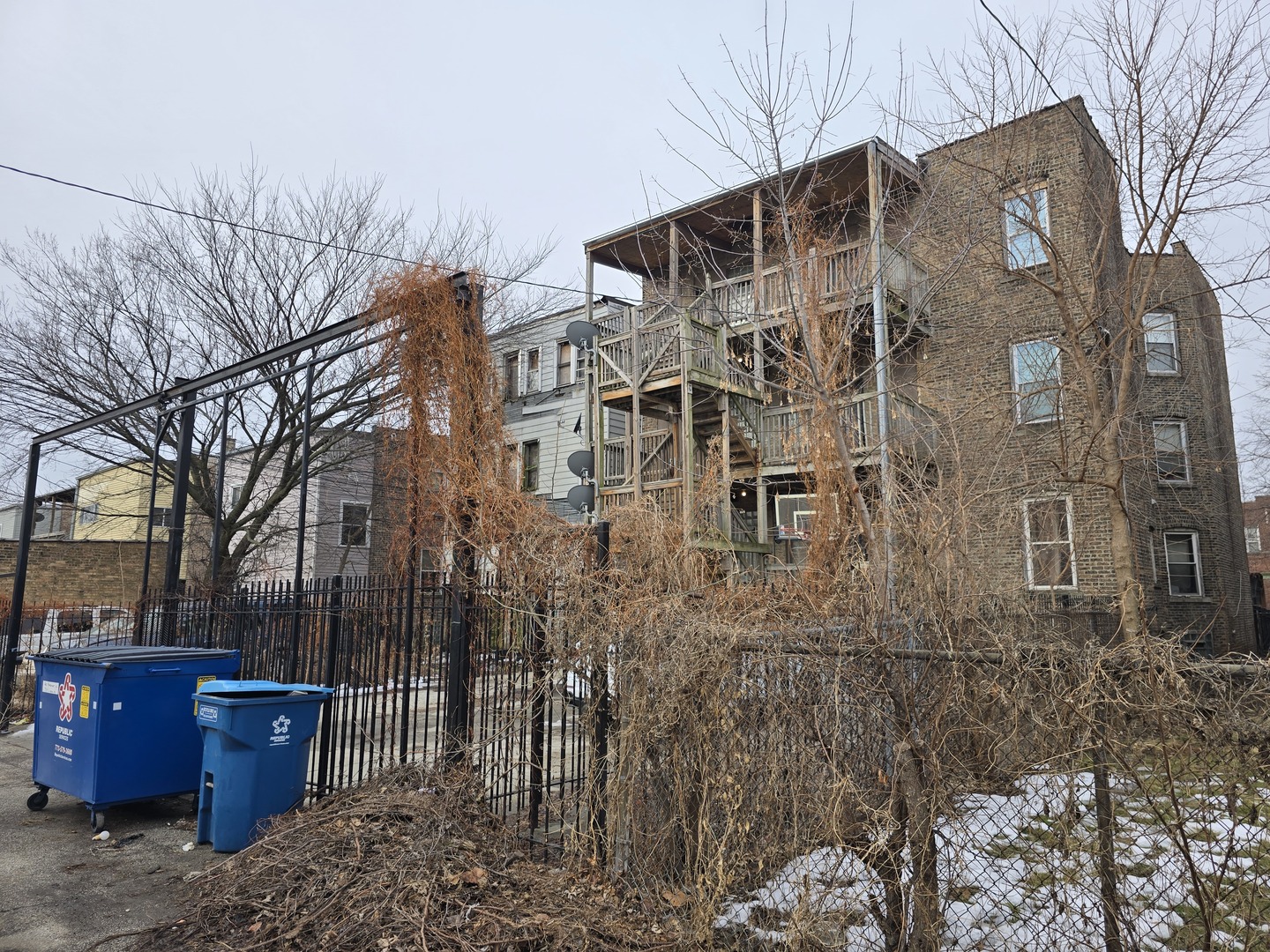 7317 South Union Avenue Chicago, IL 60621 - Photo 20 of 26 a front view of a house with a yard