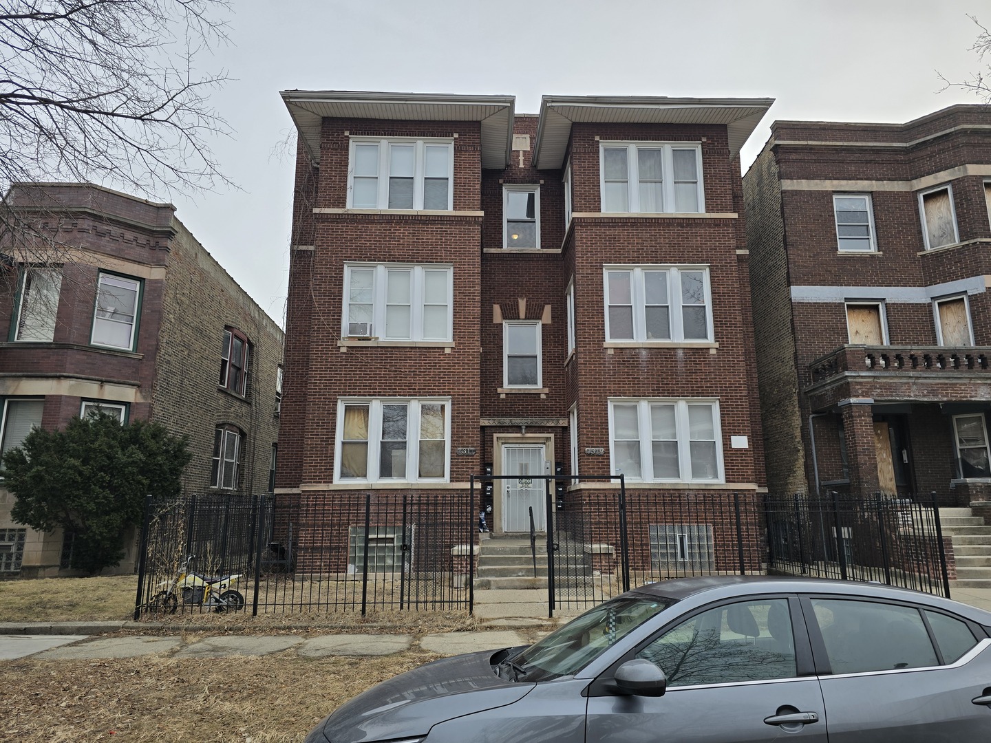 7317 South Union Avenue Chicago, IL 60621 - Photo 2 of 26 a view of a brick building with many windows