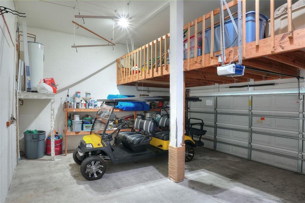 5401 Jobeth Drive New Port Richey, FL 34652 - Photo 43 of 76 Garage with elevated storage