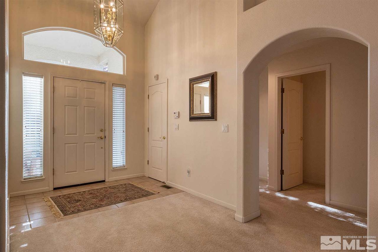 4811 East Creek Ridge Trail Reno, NV 89519 - Photo 18 of 25 an empty room with windows and closet