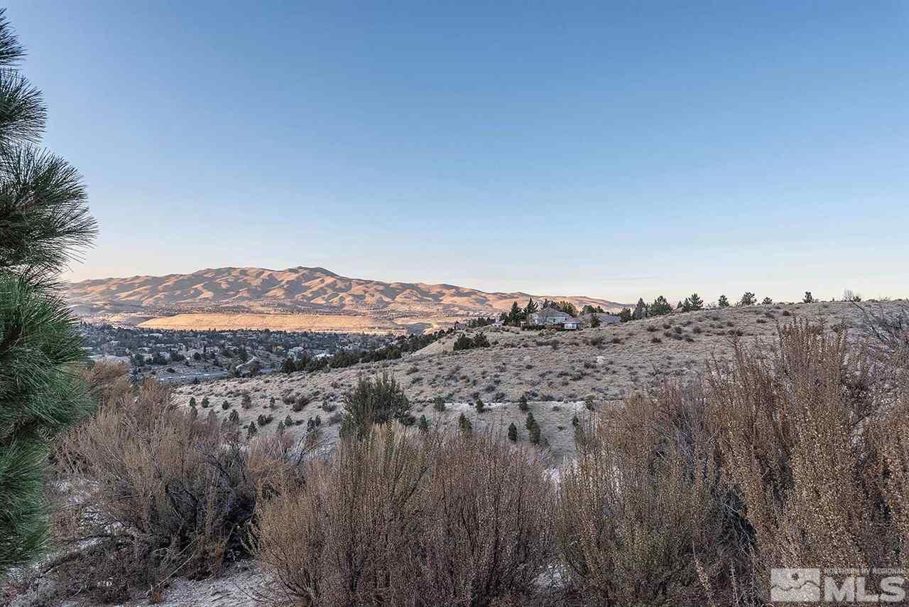4811 East Creek Ridge Trail Reno, NV 89519 - Photo 23 of 25 a view of a large body of water and mountain view