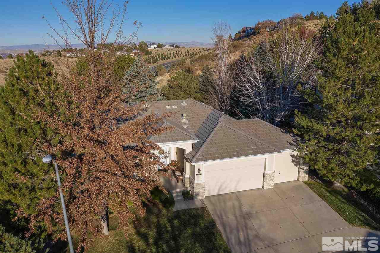 4811 East Creek Ridge Trail Reno, NV 89519 - Photo 24 of 25 a view of a house with a yard