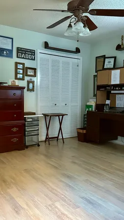 a view of a livingroom with furniture