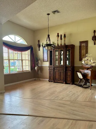 a view of a livingroom with furniture and window