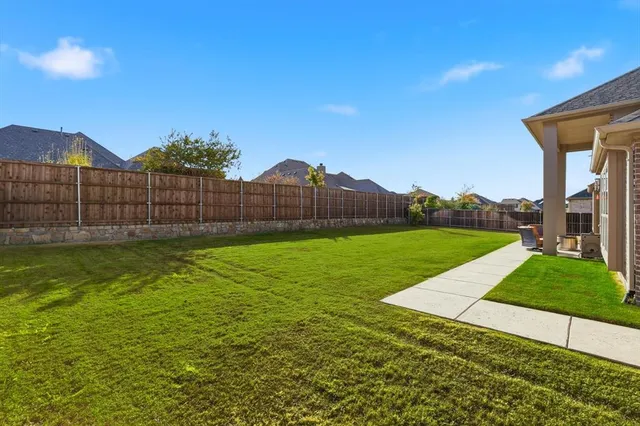 a view of a backyard with a garden