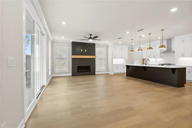 a view of kitchen and kitchen with furniture