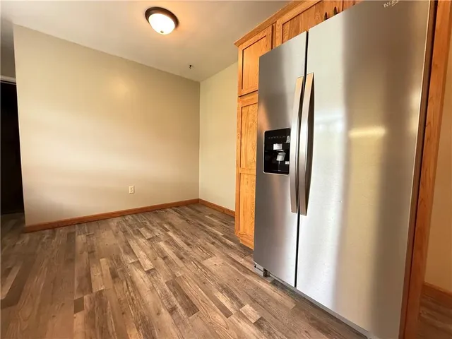 a view of a refrigerator in the kitchen