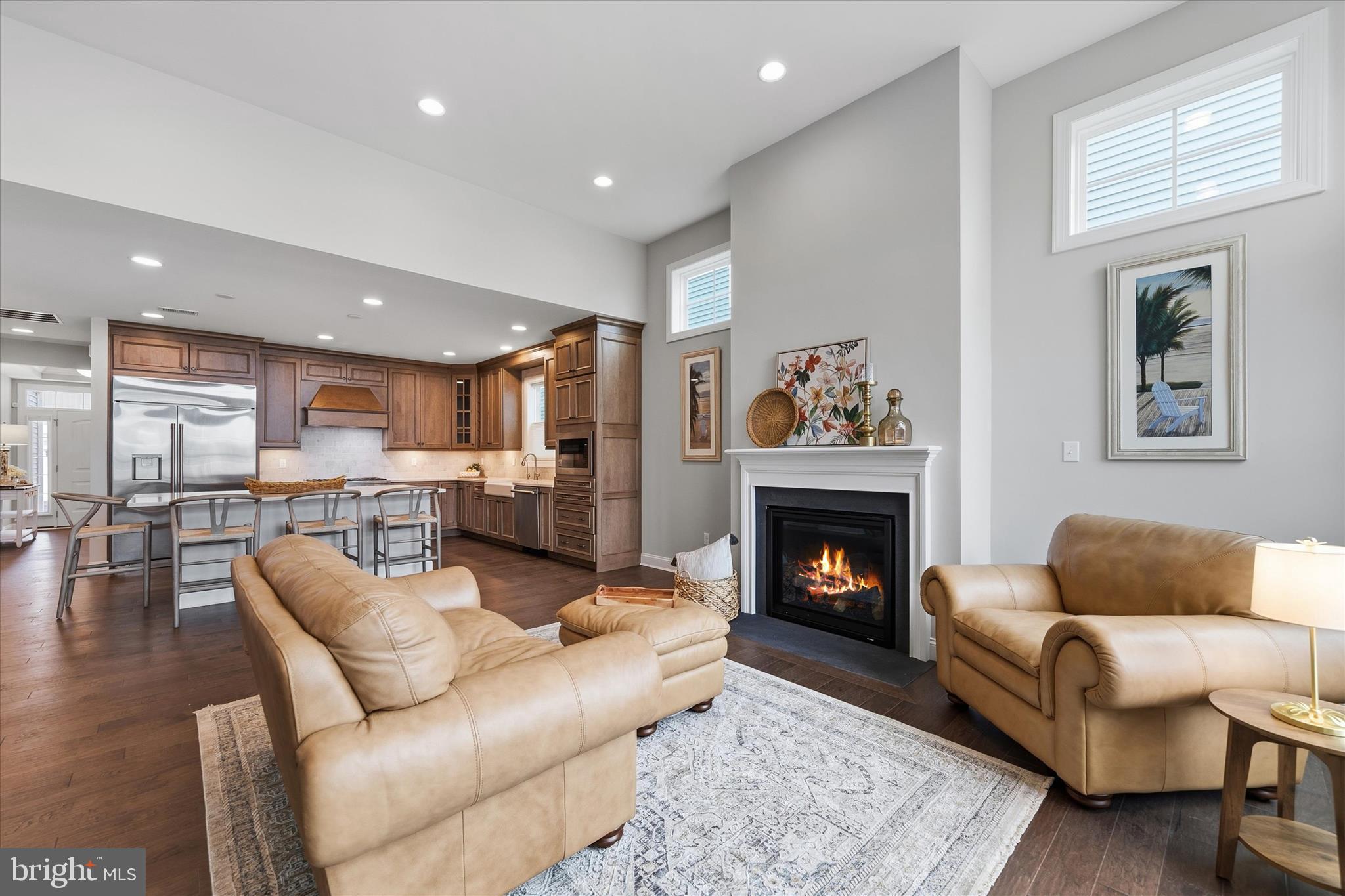 30475 Madeira Lane Ocean View, DE 19970 - Photo 11 of 38 a living room with furniture and a fireplace