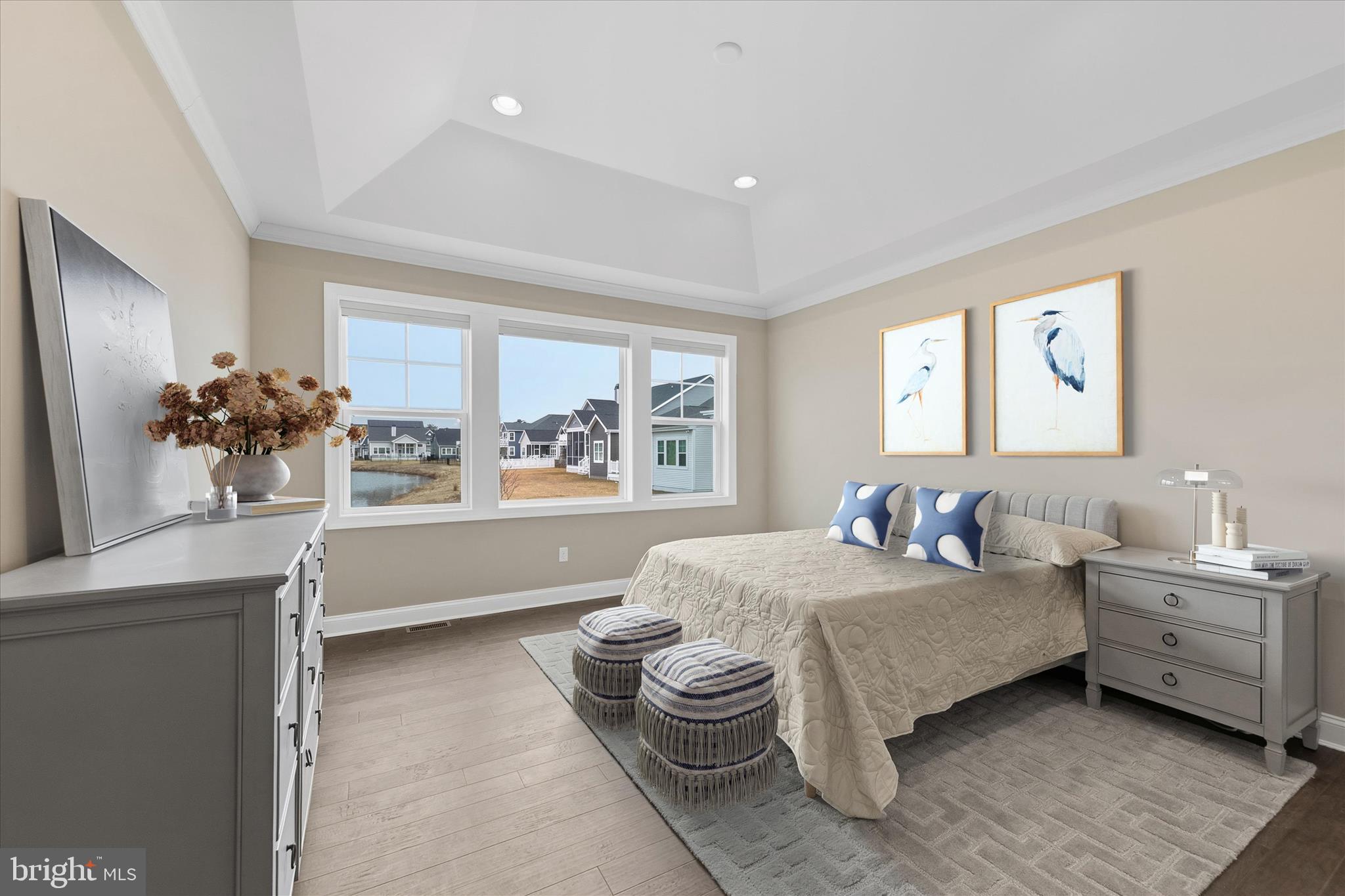 30475 Madeira Lane Ocean View, DE 19970 - Photo 16 of 38 a bedroom with a bed and a large window