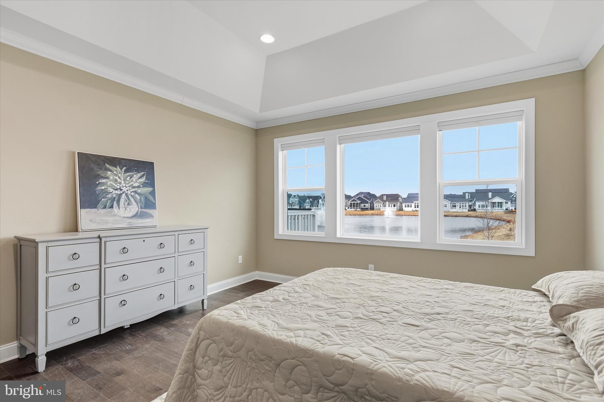 30475 Madeira Lane Ocean View, DE 19970 - Photo 18 of 31 a bedroom with a bed and a window