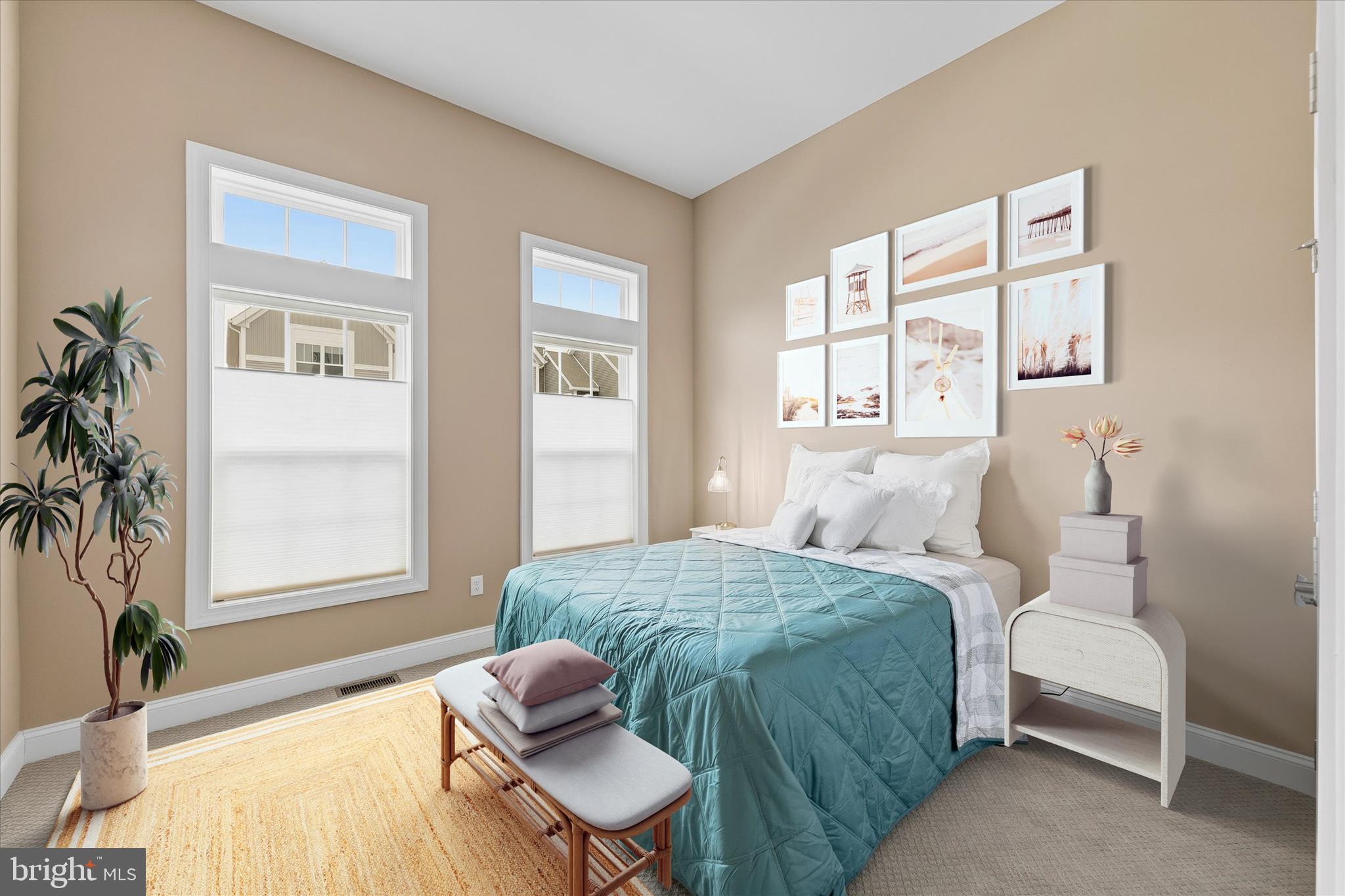 30475 Madeira Lane Ocean View, DE 19970 - Photo 22 of 31 a bedroom with a bed and a large window