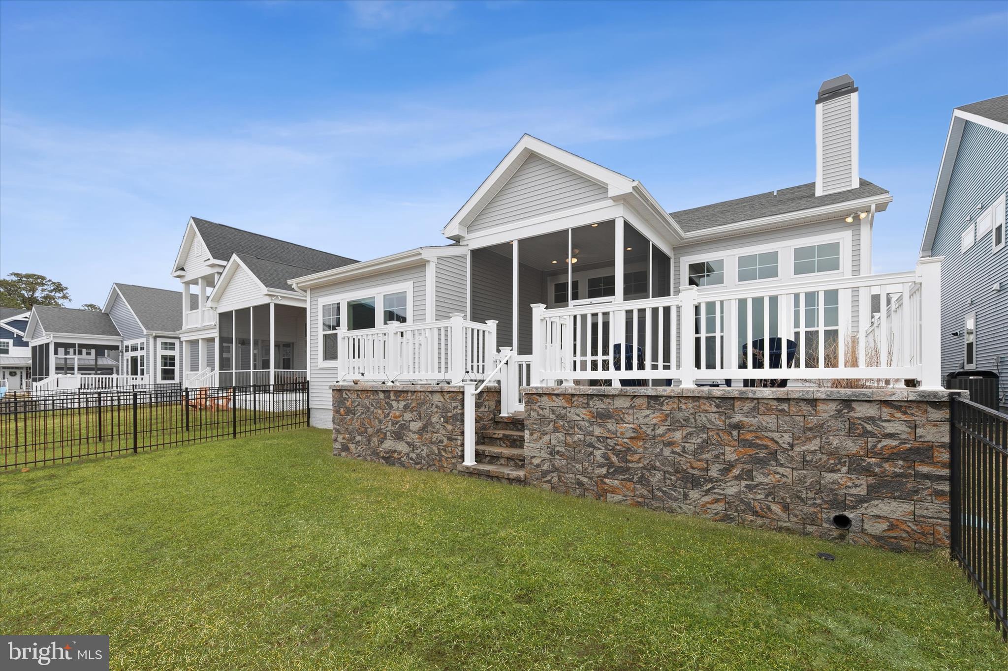 30475 Madeira Lane Ocean View, DE 19970 - Photo 27 of 38 a view of a house with a yard