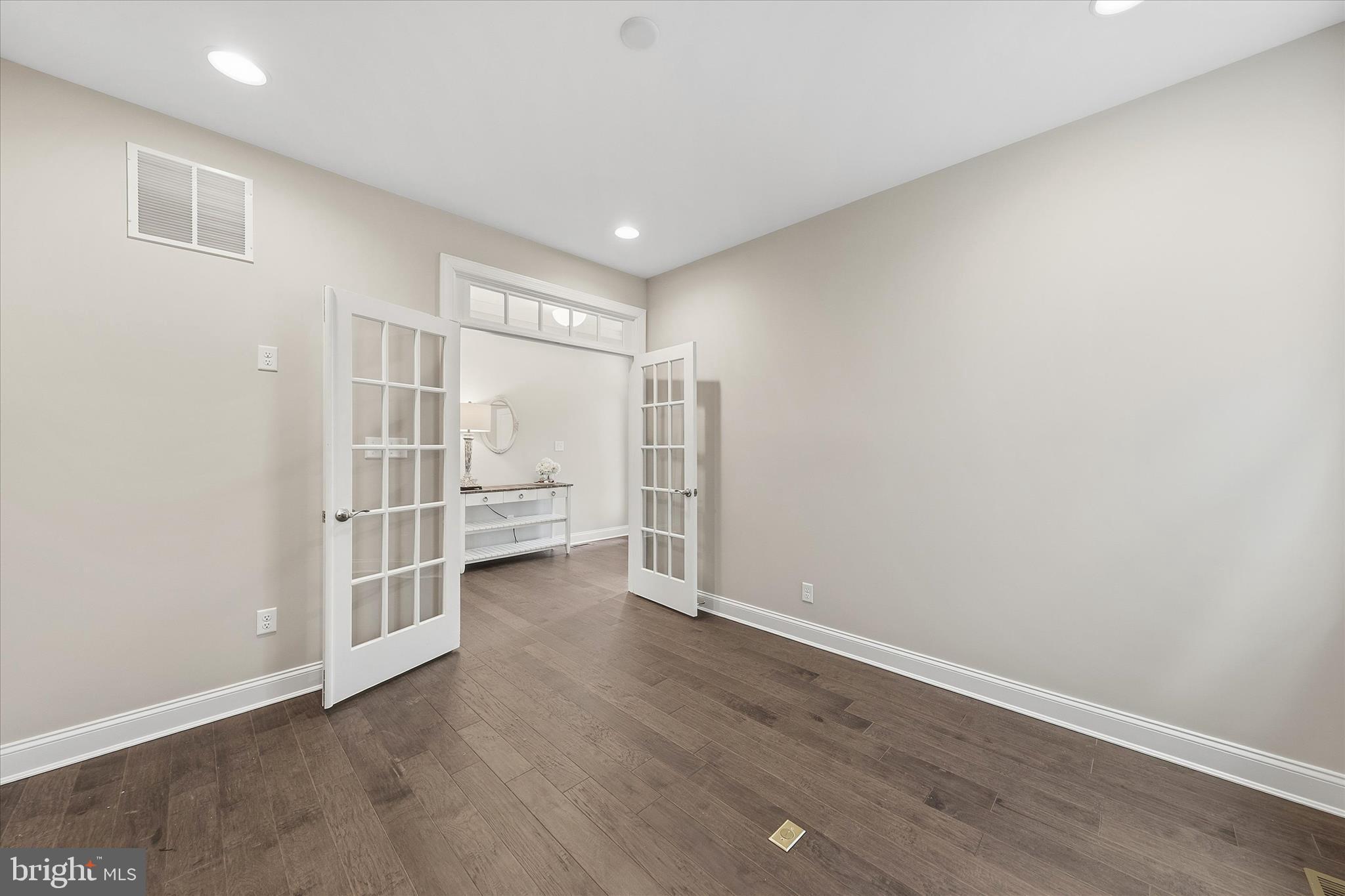 30475 Madeira Lane Ocean View, DE 19970 - Photo 6 of 38 a view of entryway with wooden floor