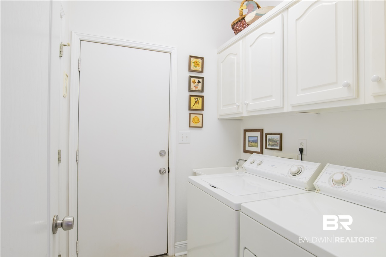 9110 Bay Point Drive Elberta, AL 36530 - Photo 19 of 50 6x6. Pantry closet. Access to attached garage.