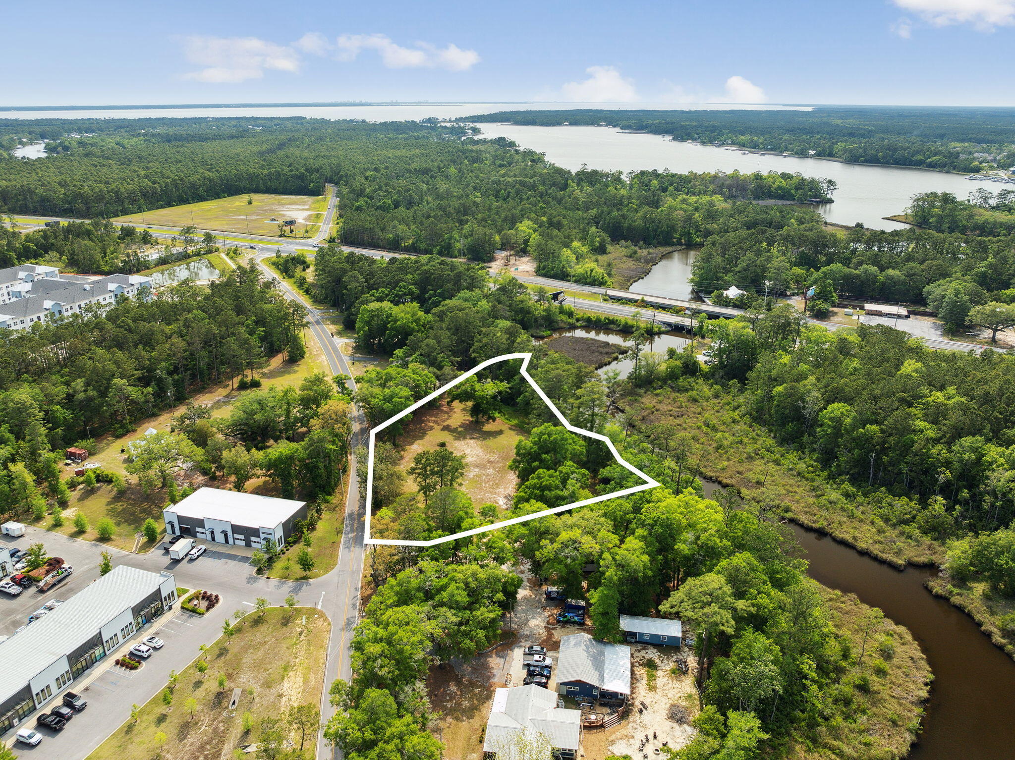 193 Ramsey Br Road Freeport, FL 32439 - Photo 1 of 25 an aerial view of houses with yard