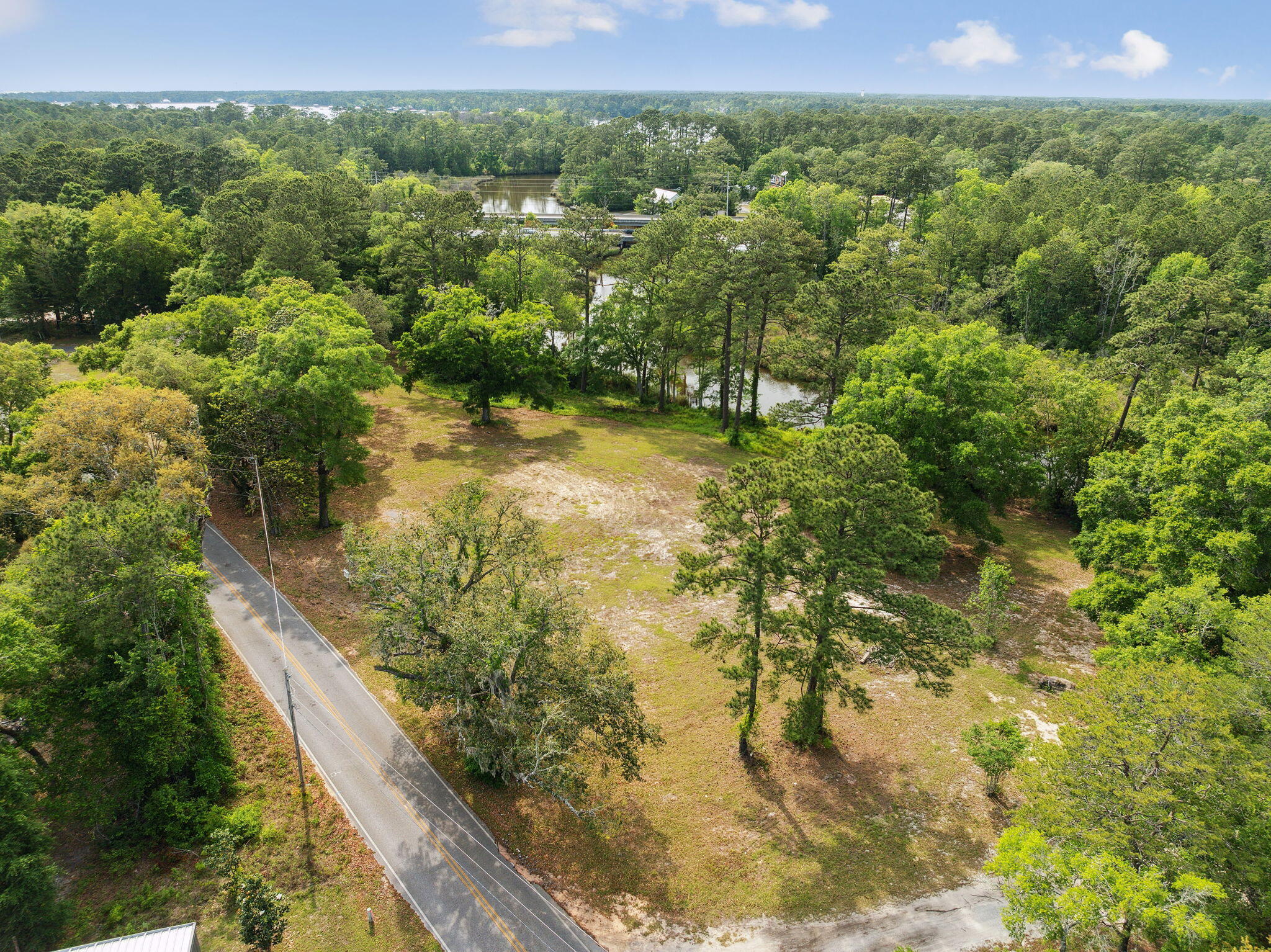 193 Ramsey Br Road Freeport, FL 32439 - Photo 15 of 25 a view of a lake from a yard