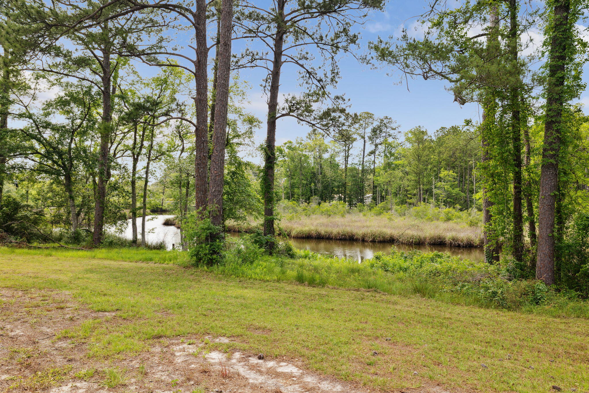 193 Ramsey Br Road Freeport, FL 32439 - Photo 20 of 25 a view of a lake with a yard