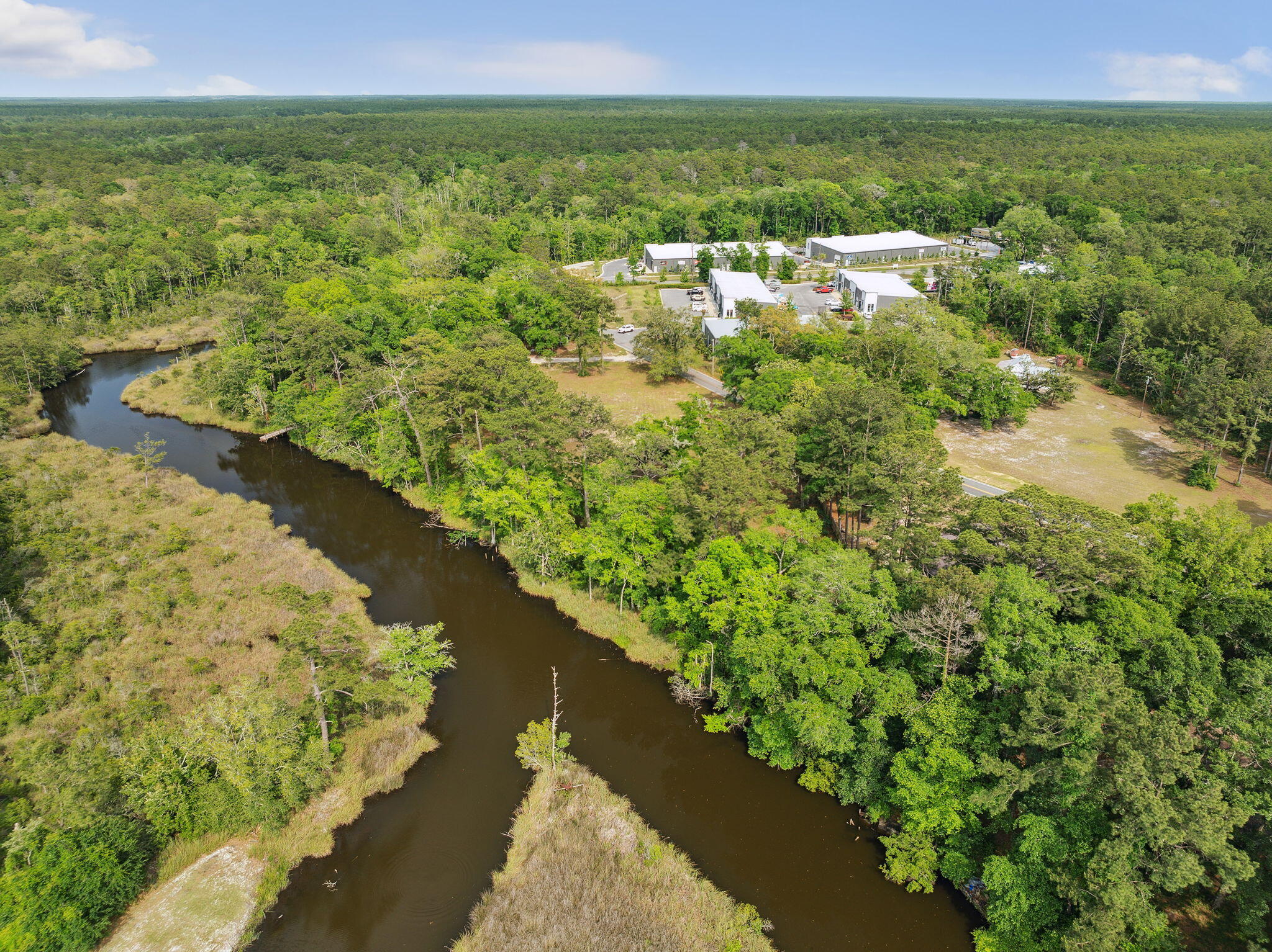 193 Ramsey Br Road Freeport, FL 32439 - Photo 3 of 25 a view of lake with city