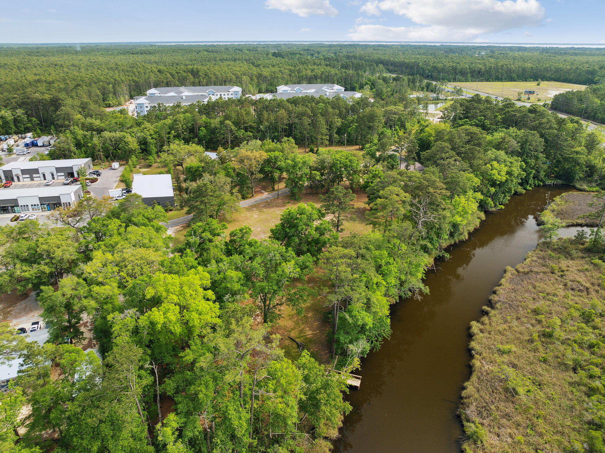 193 Ramsey Br Road Freeport, FL 32439 - Photo 7 of 25 a view of a lake with a city