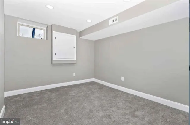 an empty room with a workbench