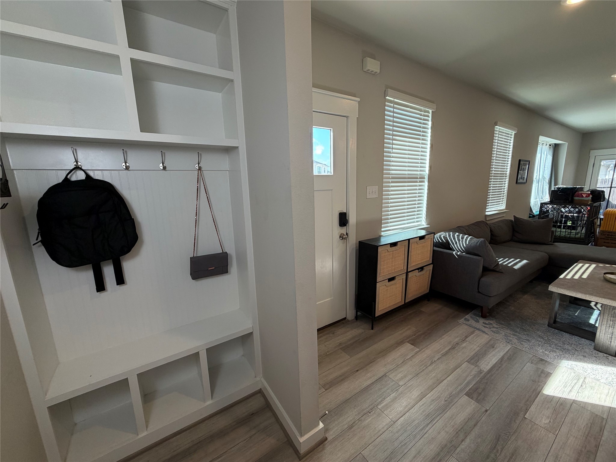 125 Threshing Road, Unit A Buda, TX 78610 - Photo 4 of 23 Mudroom featuring light wood-style floors and built in features