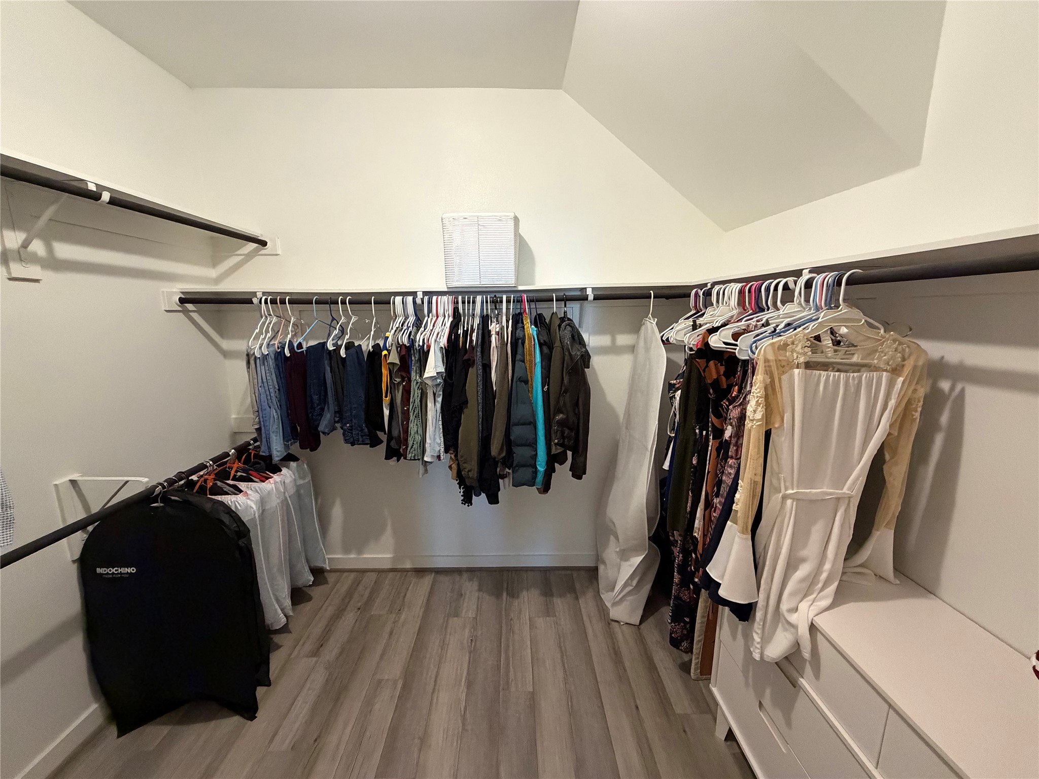 125 Threshing Road, Unit A Buda, TX 78610 - Photo 9 of 23 Walk in closet with light wood-style floors