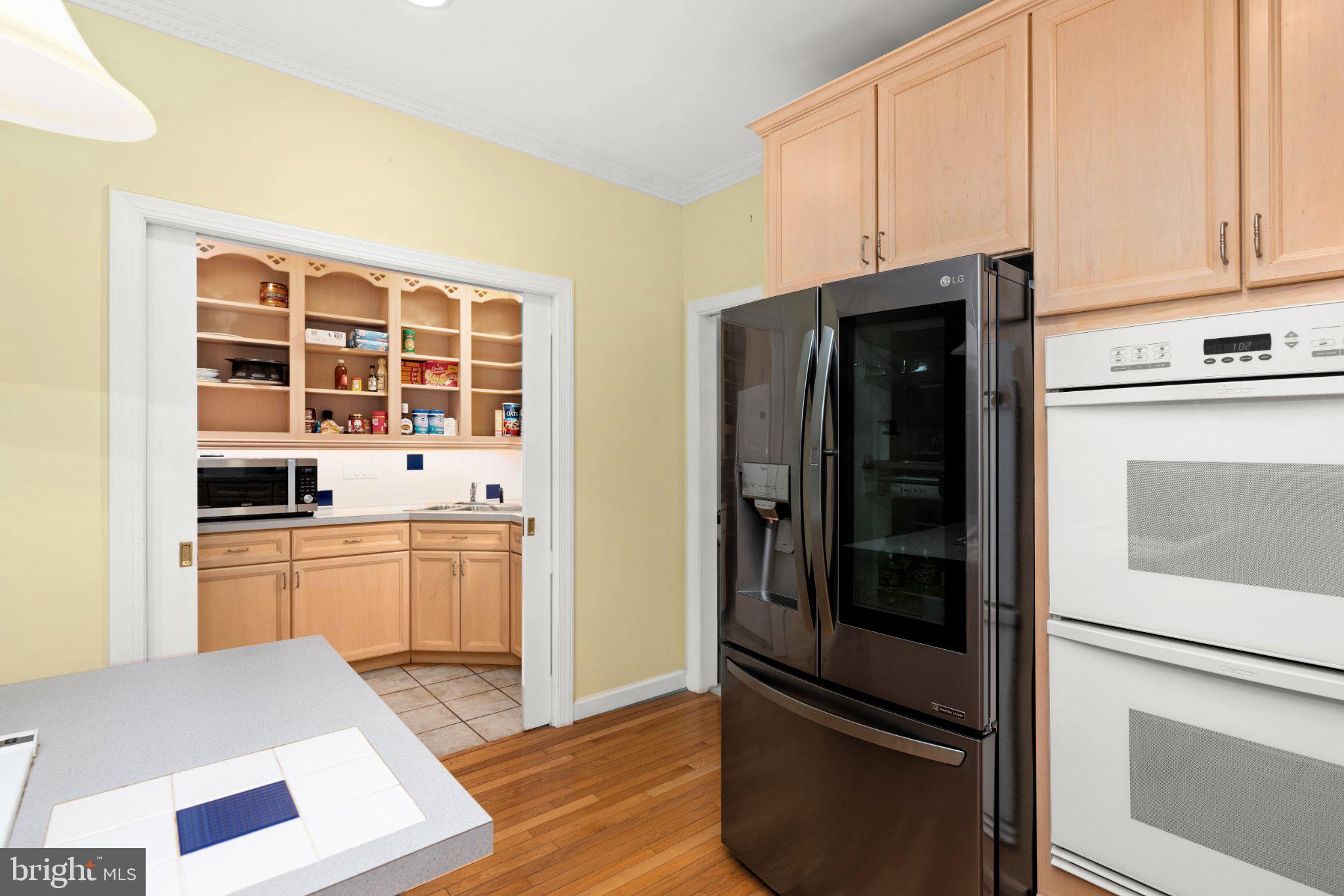 36314 Old Mill Pond Road Selbyville, DE 19975 - Photo 11 of 45 Modern kitchen with sleek appliances.