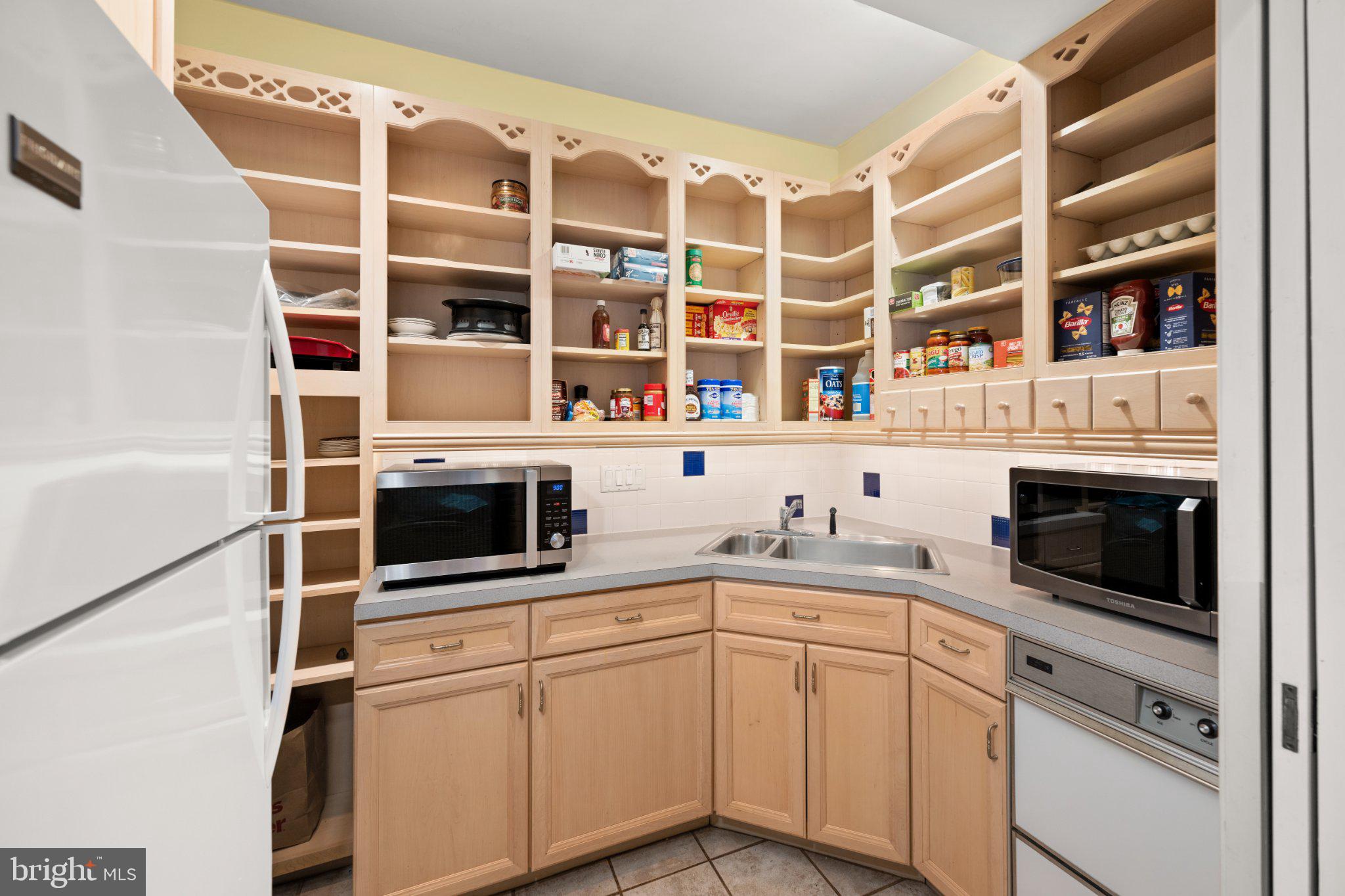 36314 Old Mill Pond Road Selbyville, DE 19975 - Photo 12 of 45 Spacious kitchen with ample storage.