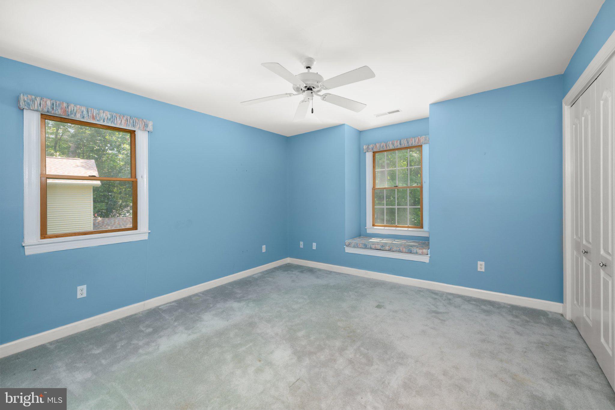 36314 Old Mill Pond Road Selbyville, DE 19975 - Photo 29 of 45 Bright blue walls invite creativity.