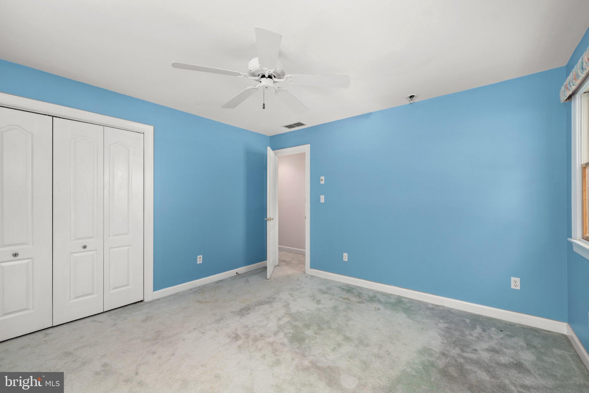36314 Old Mill Pond Road Selbyville, DE 19975 - Photo 31 of 45 Bright blue walls invite creativity.