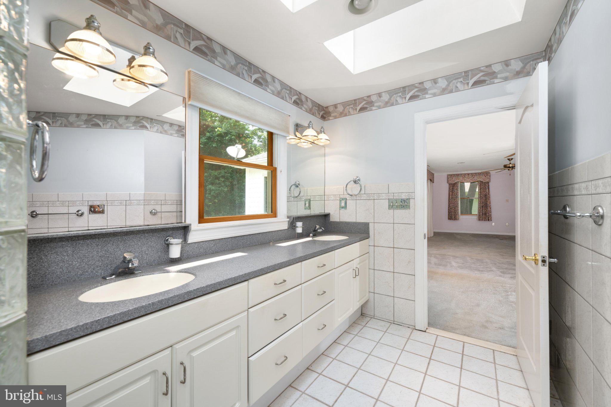 36314 Old Mill Pond Road Selbyville, DE 19975 - Photo 35 of 45 Bright and airy bathroom retreat.
