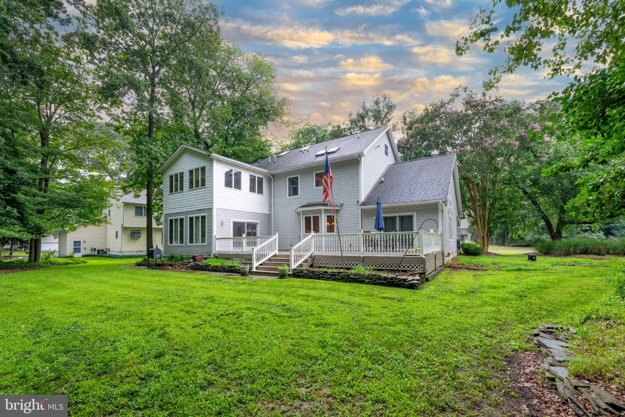 36314 Old Mill Pond Road Selbyville, DE 19975 - Photo 42 of 45 Charming home with lush green yard.