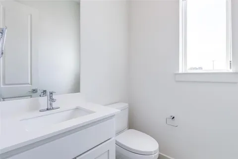 a bathroom with a sink and a toilet