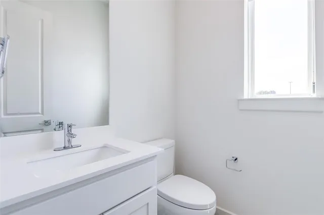 a bathroom with a sink and a toilet