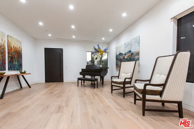 a view of a livingroom with furniture and a couch