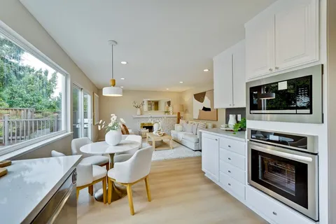 a view of bathroom with sink and window