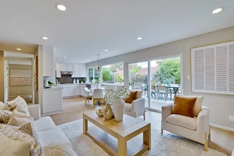 a bedroom with double bed and a window