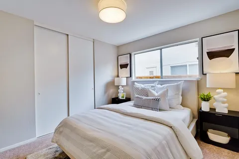 a bathroom with a sink vanity and a mirror