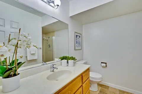 a bedroom with bed and a window