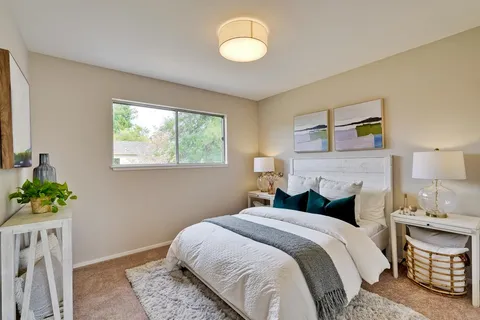a living room with furniture and window