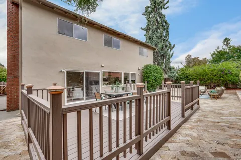 a picture of a bench in a white wall