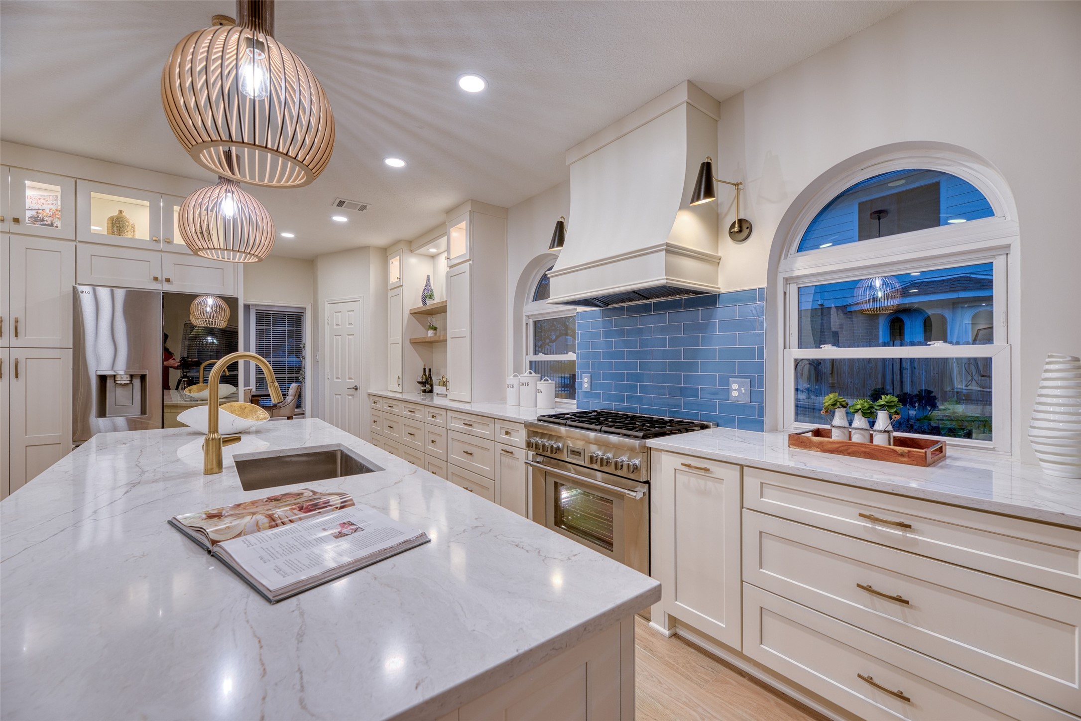 19303 Allview Lane Houston, TX 77094 - Photo 13 of 50 Stainless steel refrigerator with custom cabinetry surround.
