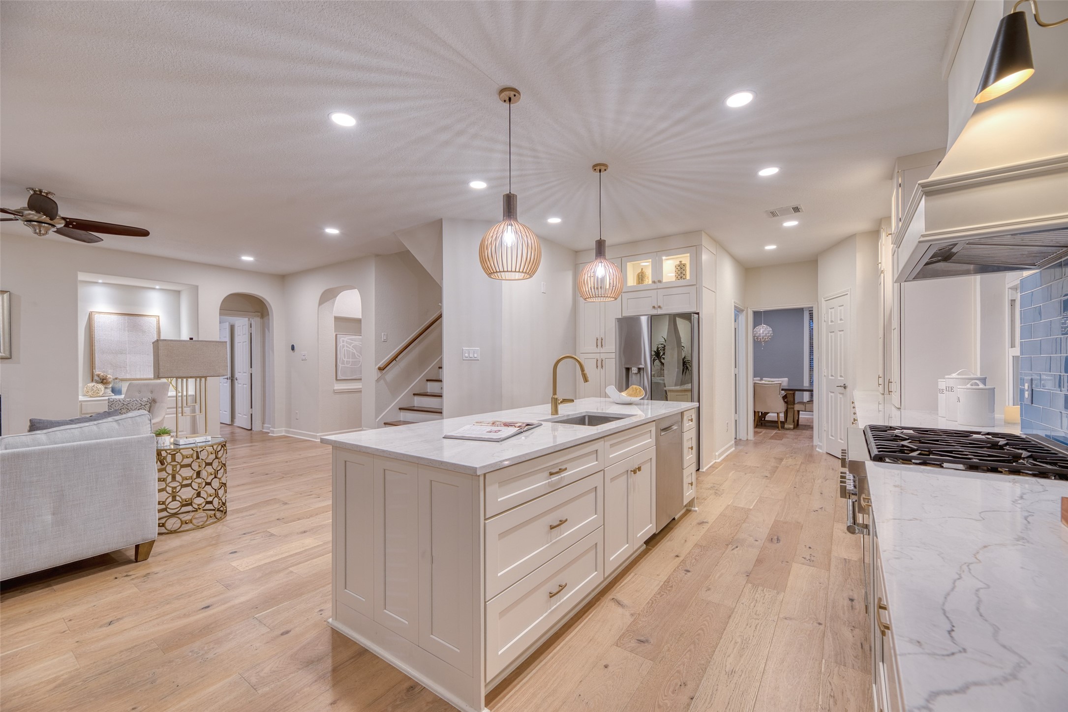 19303 Allview Lane Houston, TX 77094 - Photo 16 of 50 Large island sink with designer faucet and ample workspace. Gorgeous white oak flooring and quartz countertops.