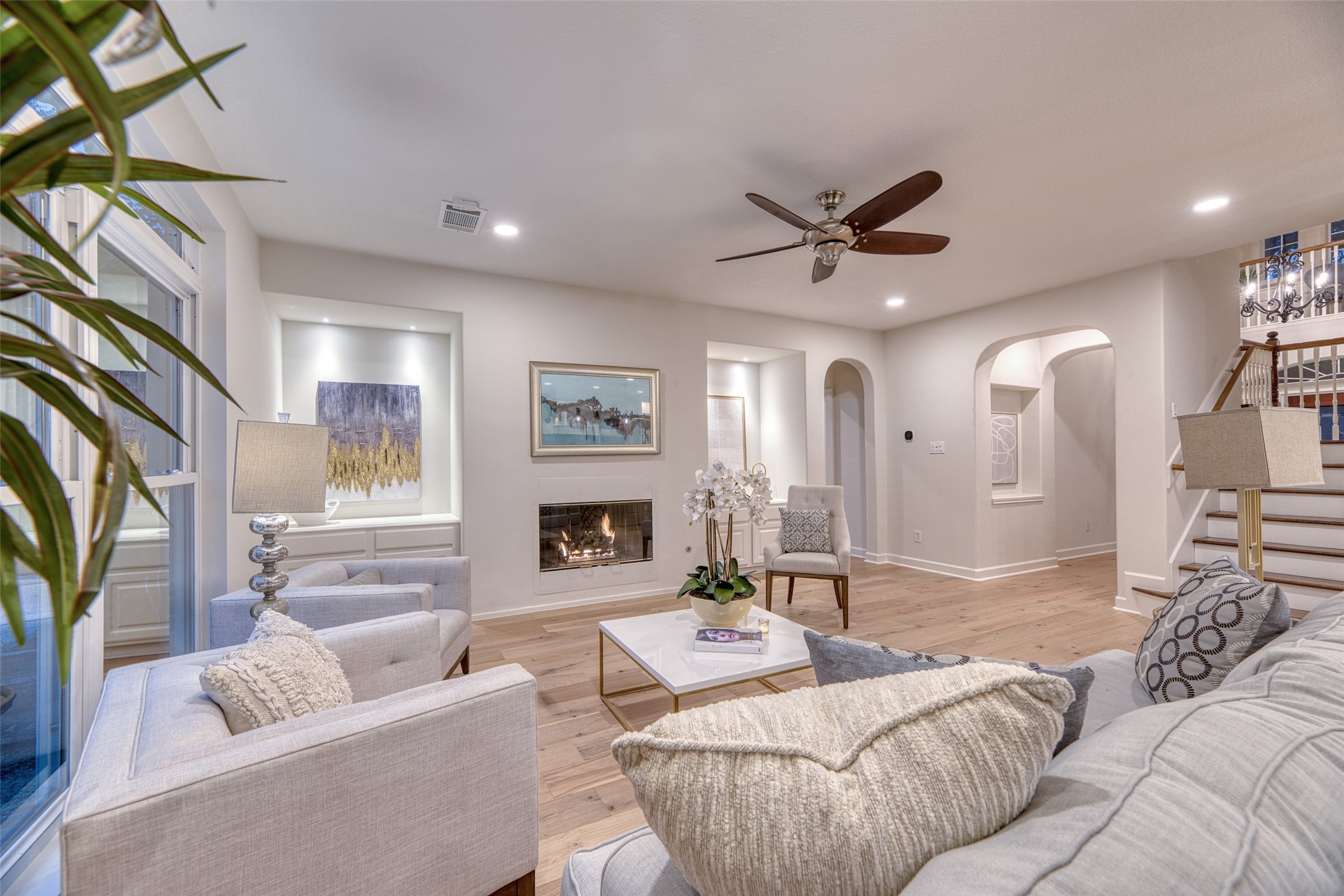19303 Allview Lane Houston, TX 77094 - Photo 17 of 50 Spacious living room with wood flooring, recessed lighting, and ceiling fan.