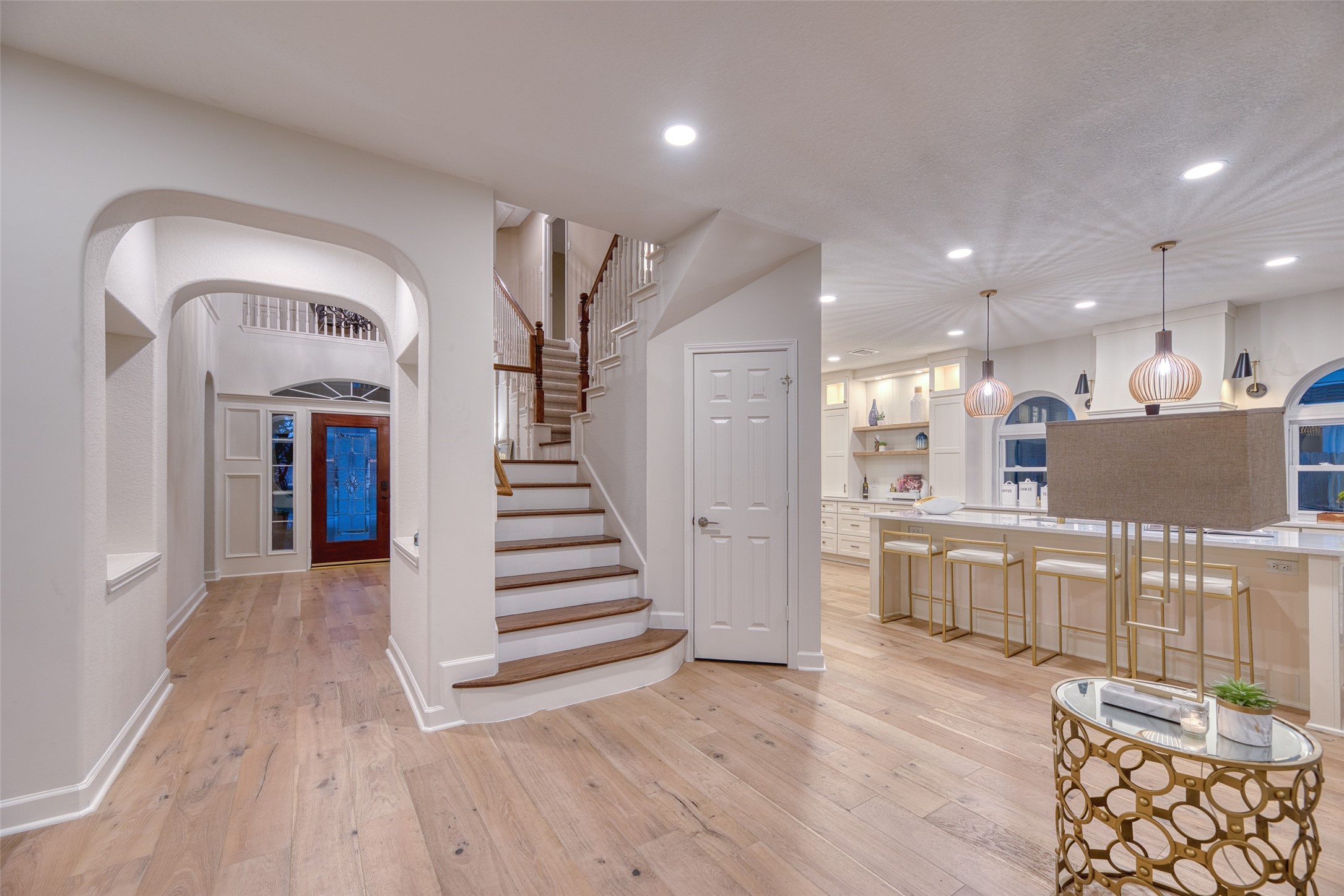 19303 Allview Lane Houston, TX 77094 - Photo 23 of 50 Grand entry with soaring ceilings, arched doorways, and elegant staircase.